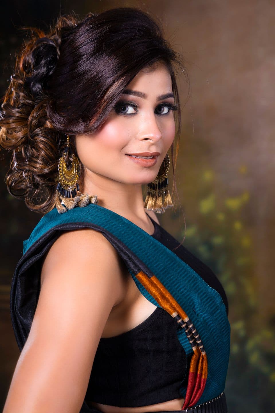 Indian model in traditional attire with occasion makeup